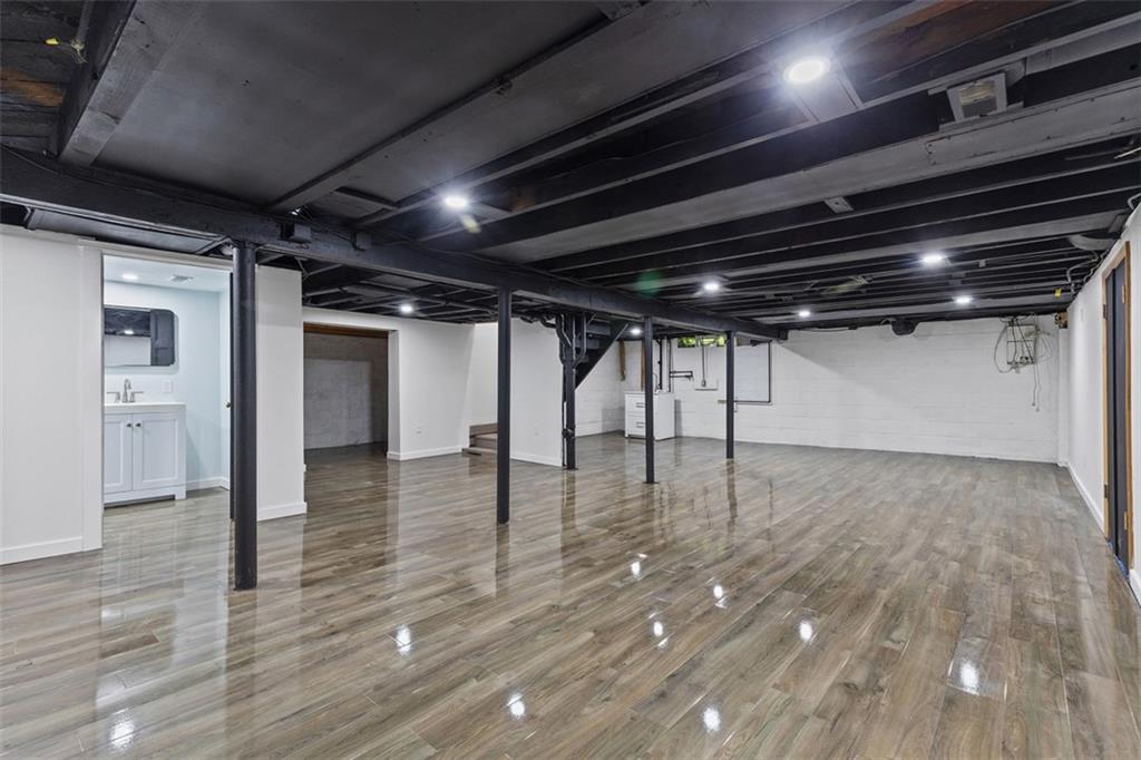 234 Navajo Road Pittsburgh, PA 15241 - Photo 30 of 34 The game room is huge with plenty of room for multiple living spaces.