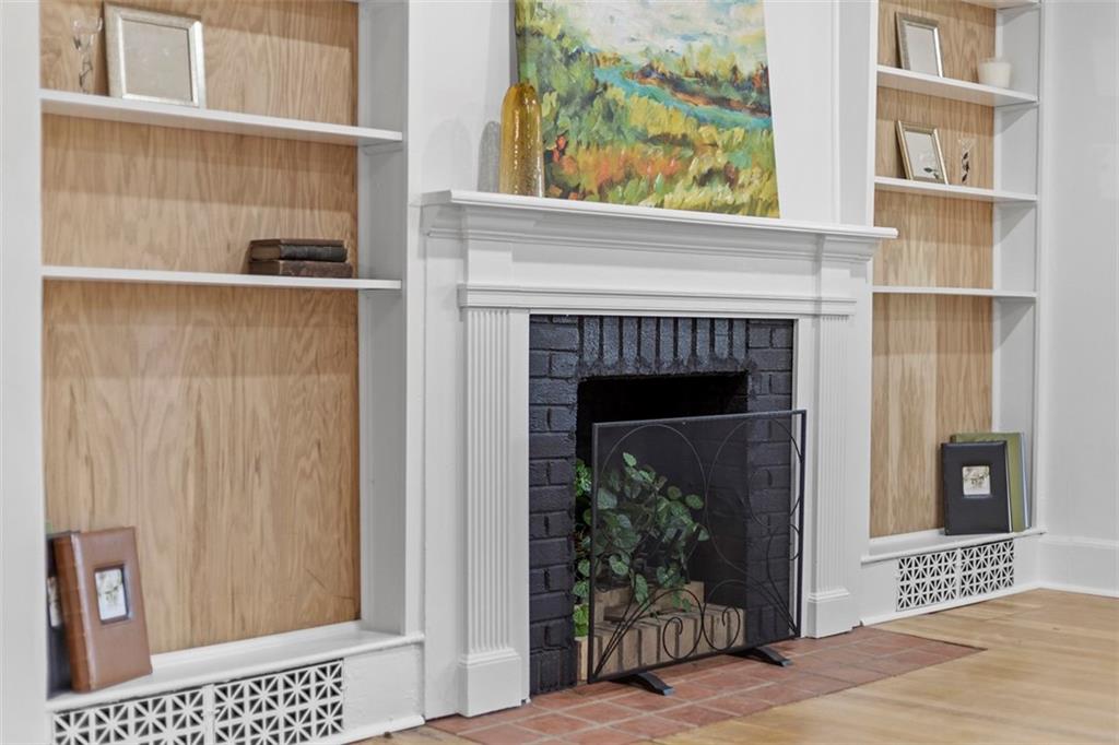 234 Navajo Road Pittsburgh, PA 15241 - Photo 6 of 34 The decorative fireplace is flanked by built-ins.