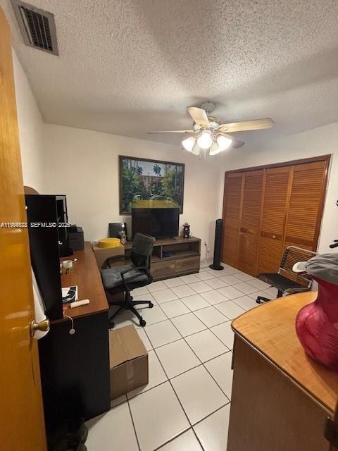 5852 Southwest 147th Place Miami, FL 33193 - Photo 3 of 11 a work room with furniture and a flat screen tv