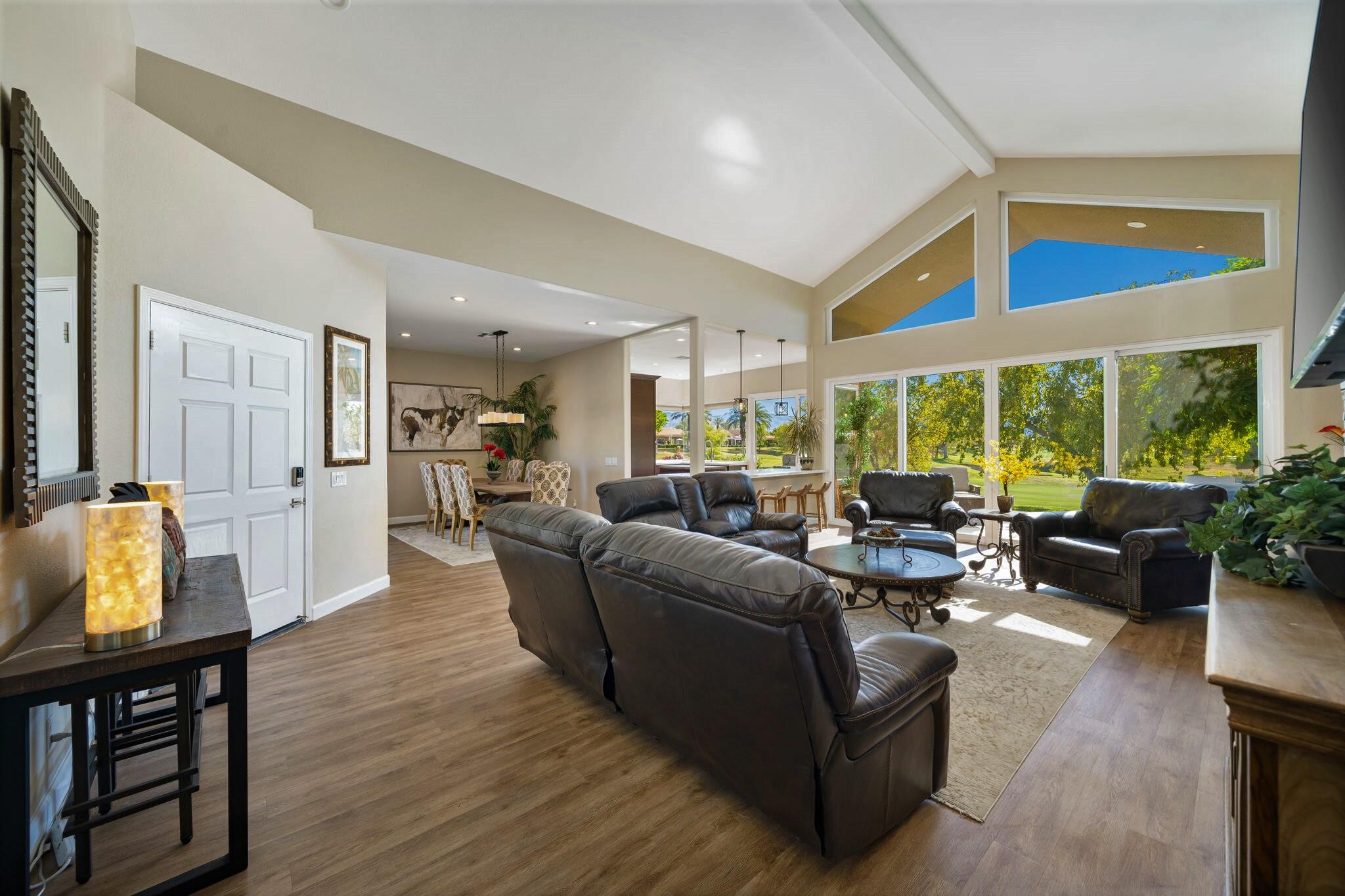 33 Colonial Drive Rancho Mirage, CA 92270 - Photo 11 of 62 a living room with furniture and a large window