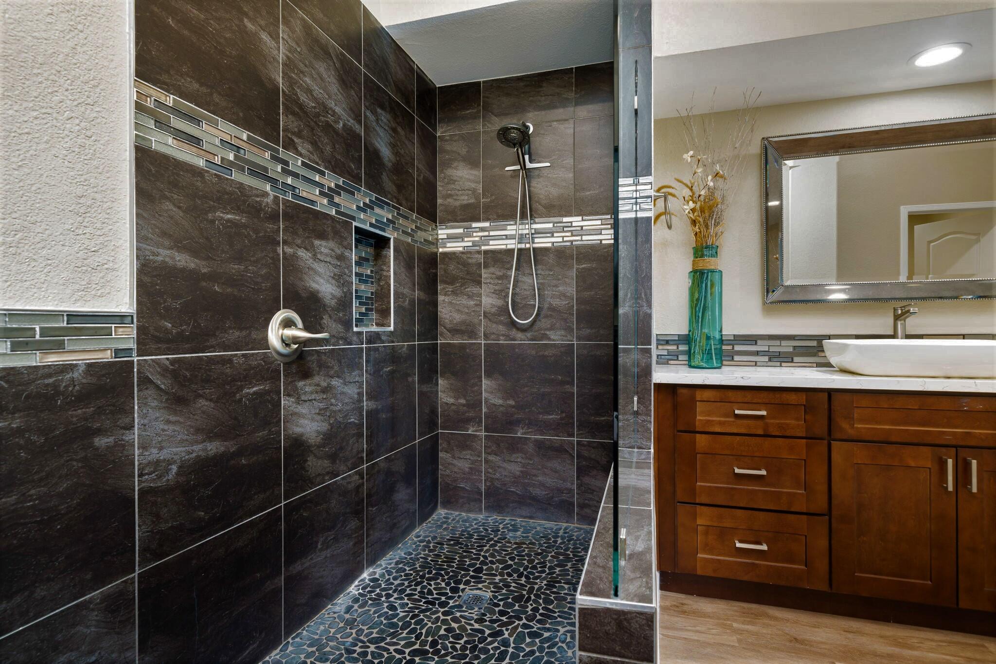 33 Colonial Drive Rancho Mirage, CA 92270 - Photo 30 of 62 a bathroom with a shower a sink and mirror