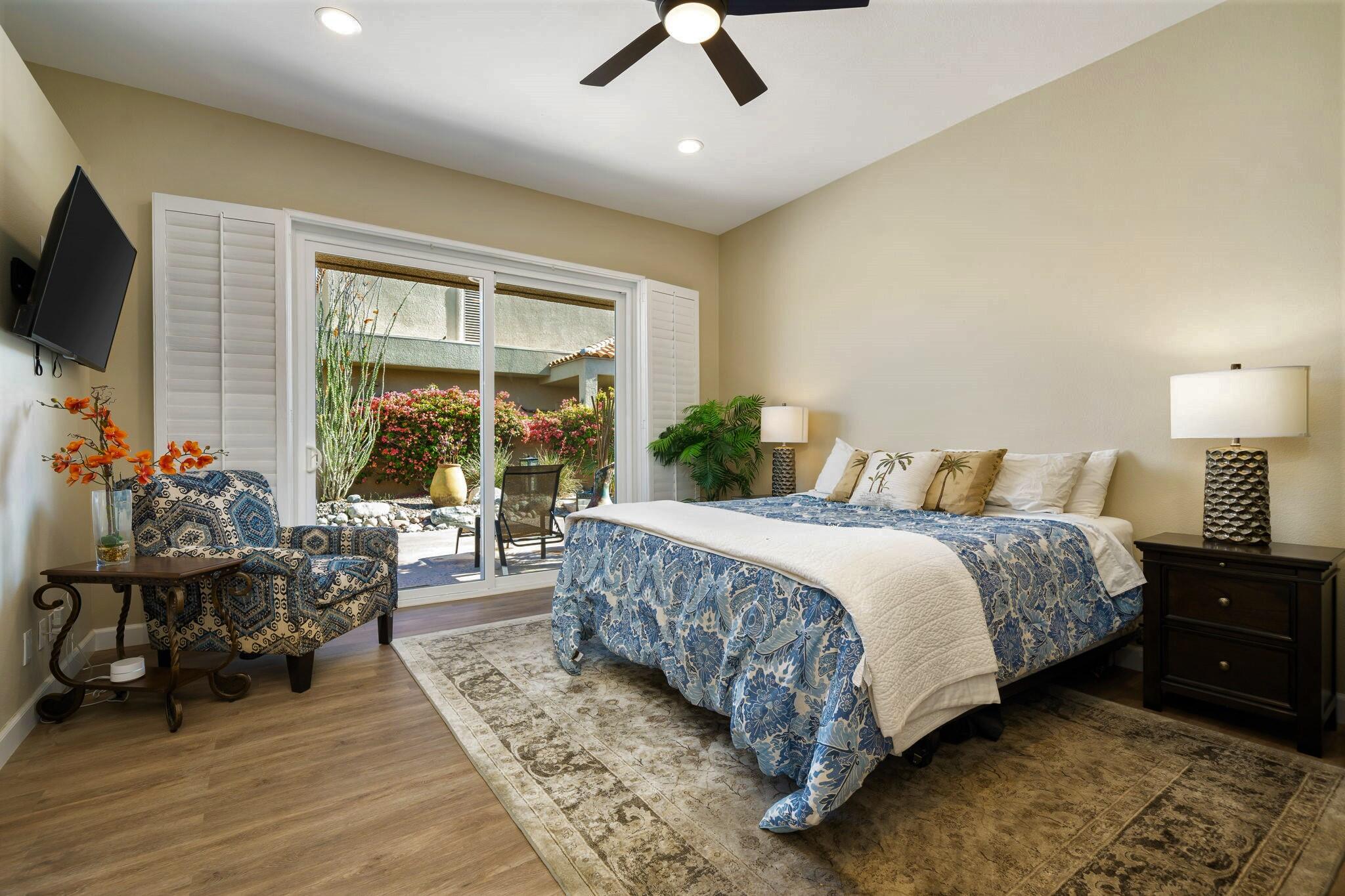 33 Colonial Drive Rancho Mirage, CA 92270 - Photo 35 of 62 a spacious bedroom with a bed and a flat screen tv