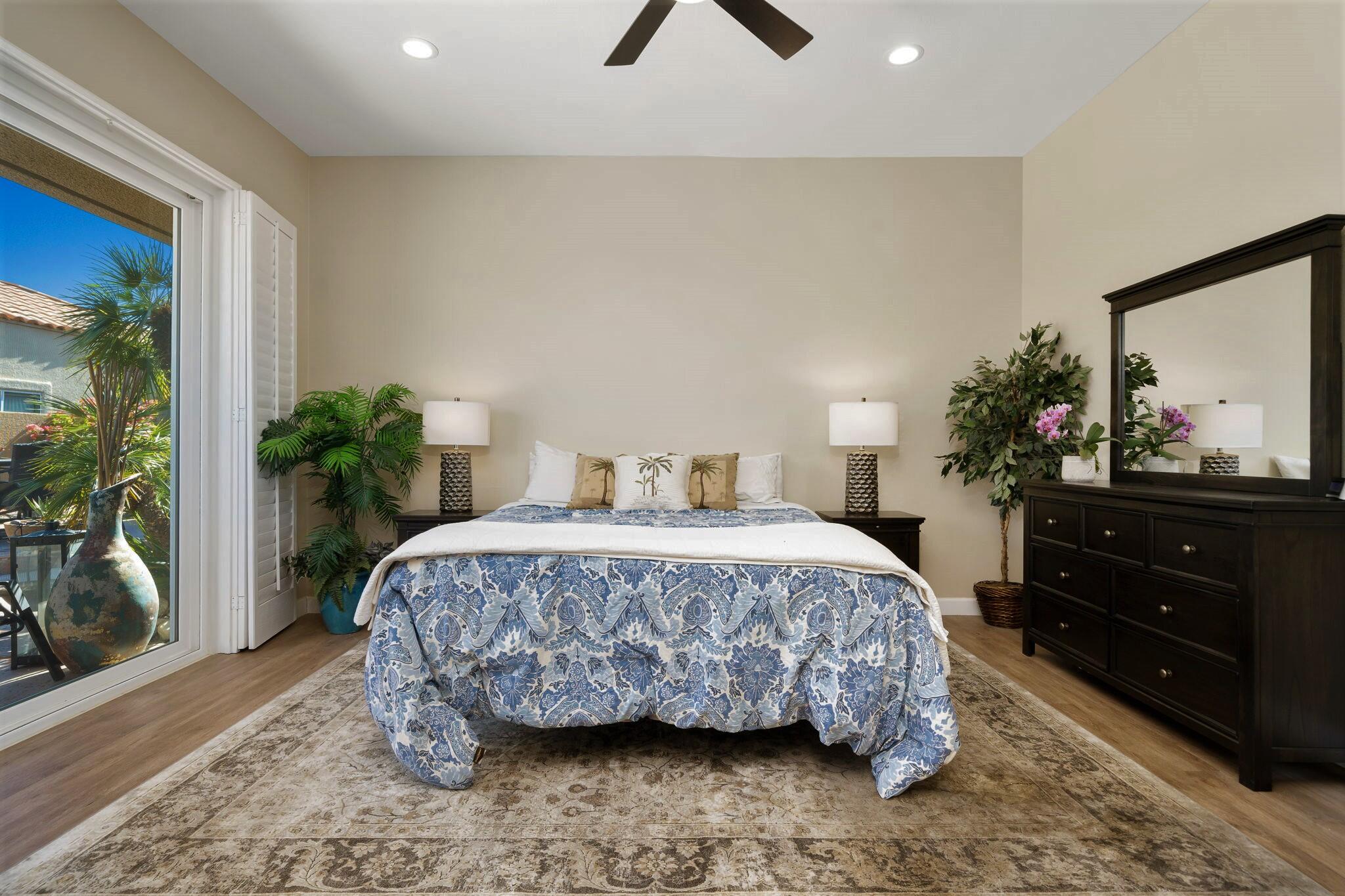 33 Colonial Drive Rancho Mirage, CA 92270 - Photo 36 of 62 a bedroom with a bed and a potted plant