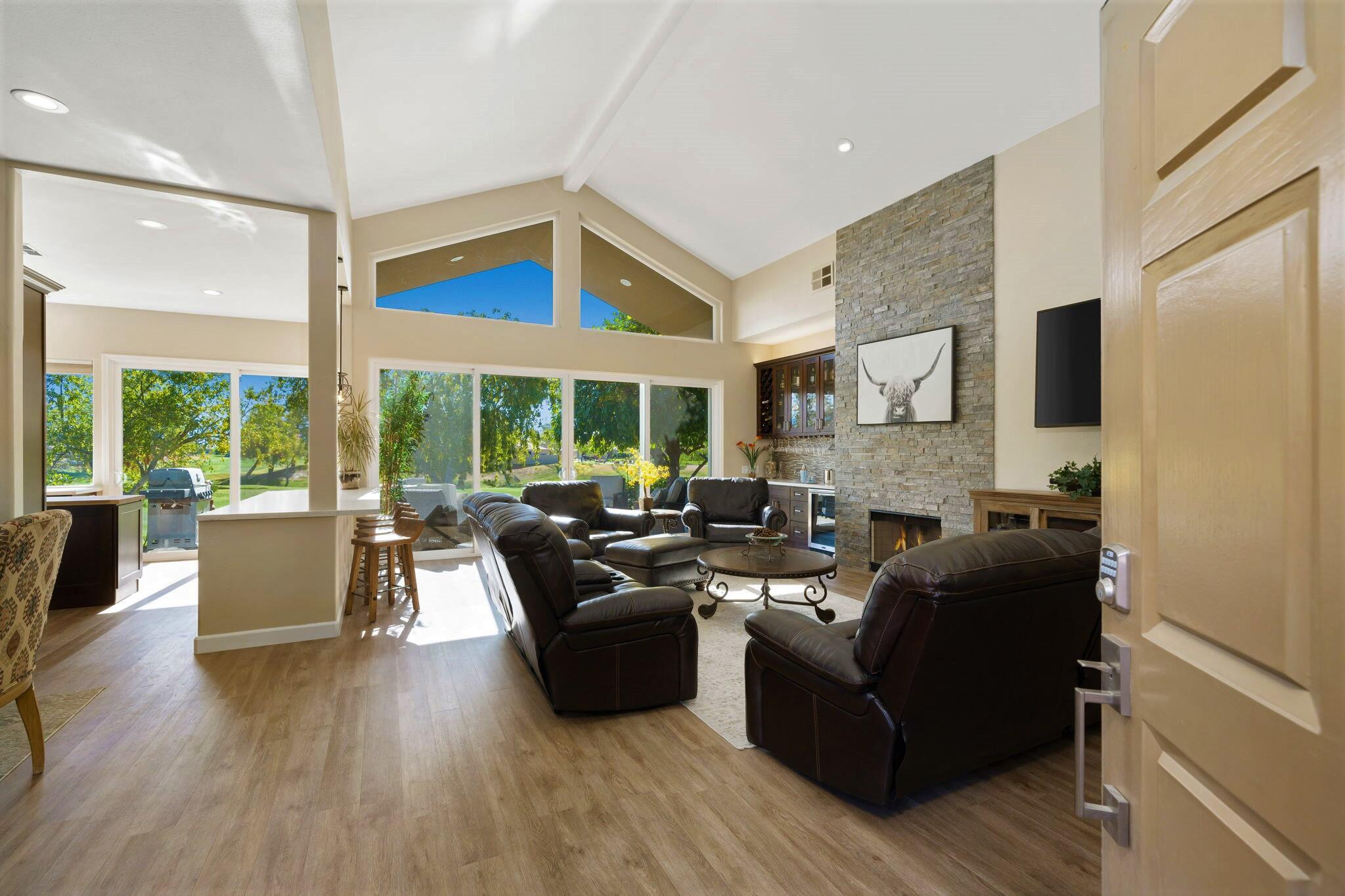 33 Colonial Drive Rancho Mirage, CA 92270 - Photo 9 of 62 a living room with furniture and a large window