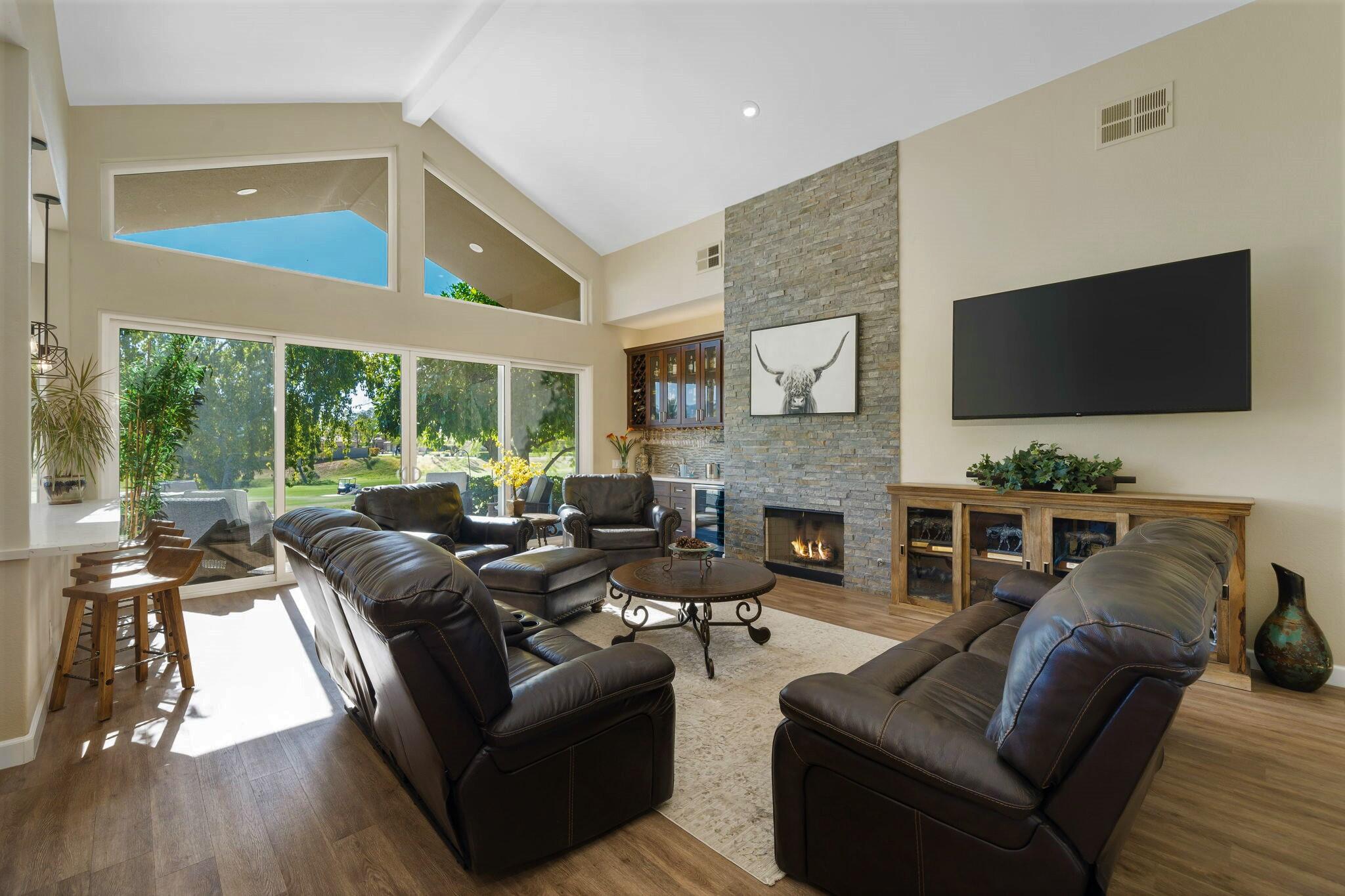 33 Colonial Drive Rancho Mirage, CA 92270 - Photo 10 of 62 a living room with furniture and a flat screen tv
