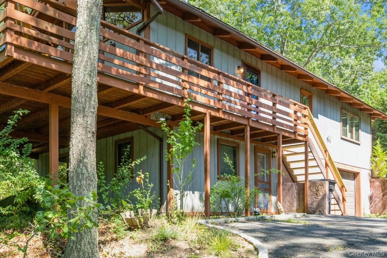292 Little Fresh Pond Road Southampton, NY 11968 - Photo 43 of 46 View of property exterior with a deck