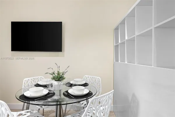 a view of a dining room with furniture