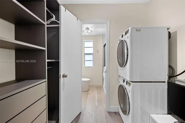 a utility room with dryer and washer