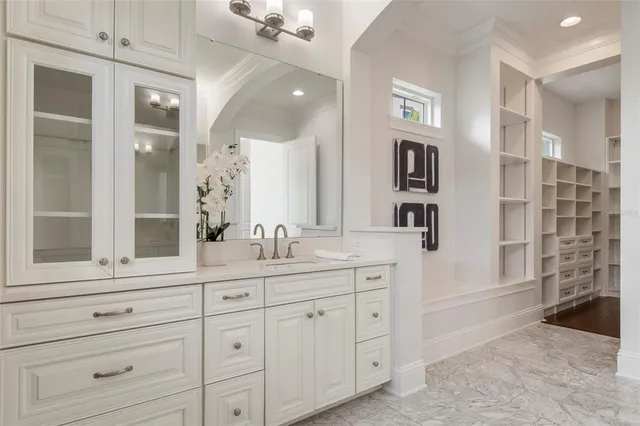 an empty room with wooden floor and closet