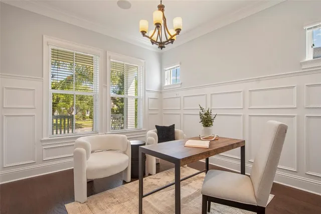 a bathroom with a granite countertop sink a toilet and a mirror