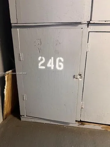 an empty room with a wooden door