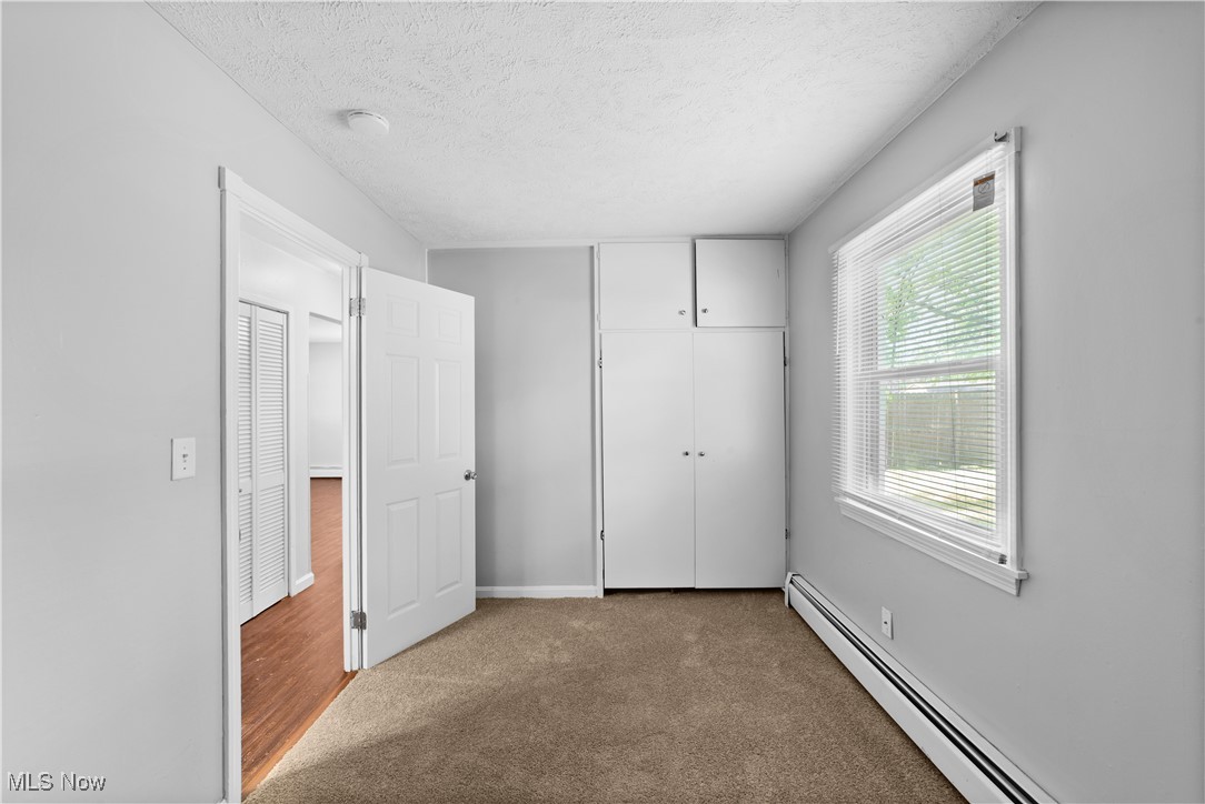 4920 Marigold Road Mentor, OH 44060 - Photo 15 of 34 1 of 2 bedrooms on 1st Floor with new carpeting and freshly painted