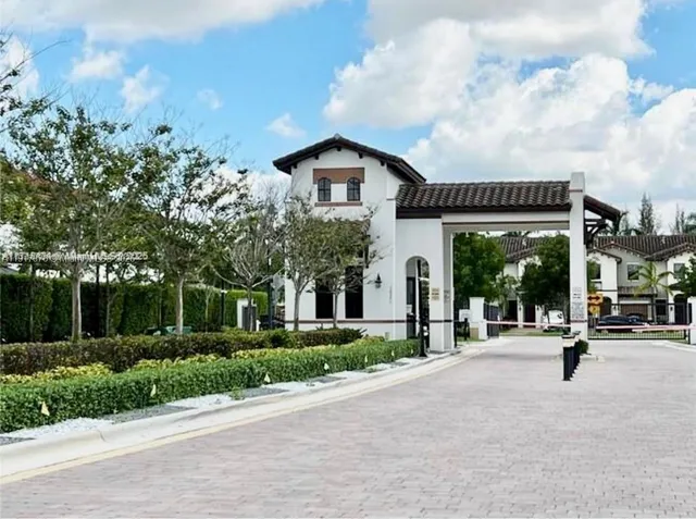 a house view with a garden space