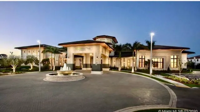 an aerial view of a house with outdoor space