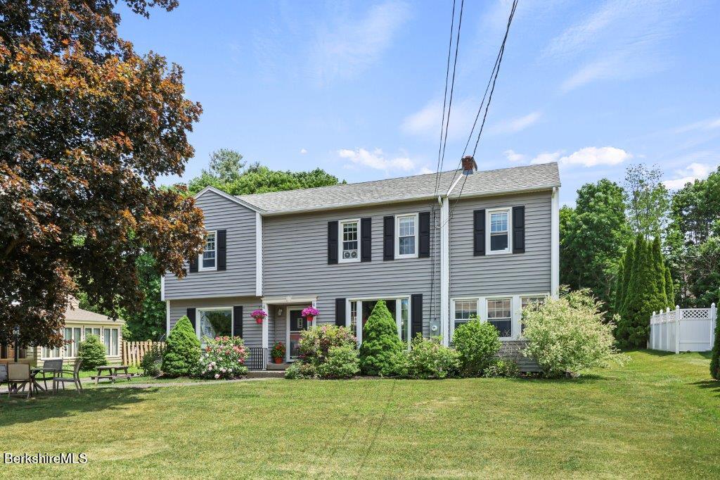 33 Eleanor Road Pittsfield, MA 01201 - Photo 3 of 45 a front view of a house with a yard