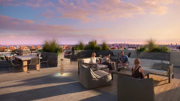 a view of a terrace with sitting area
