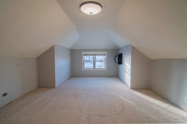 a view of empty room with windows