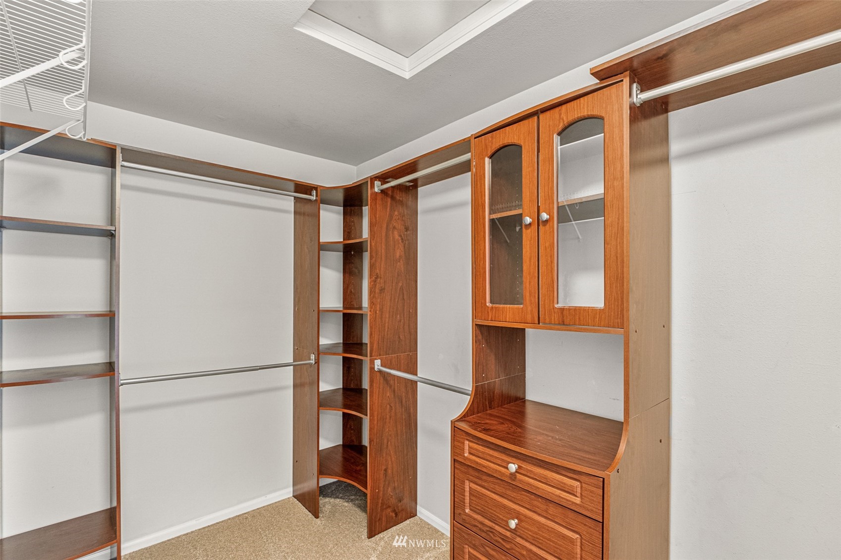 3509 160th Place Southeast Bothell, WA 98012 - Photo 19 of 31 a view of walk in closet with empty racks