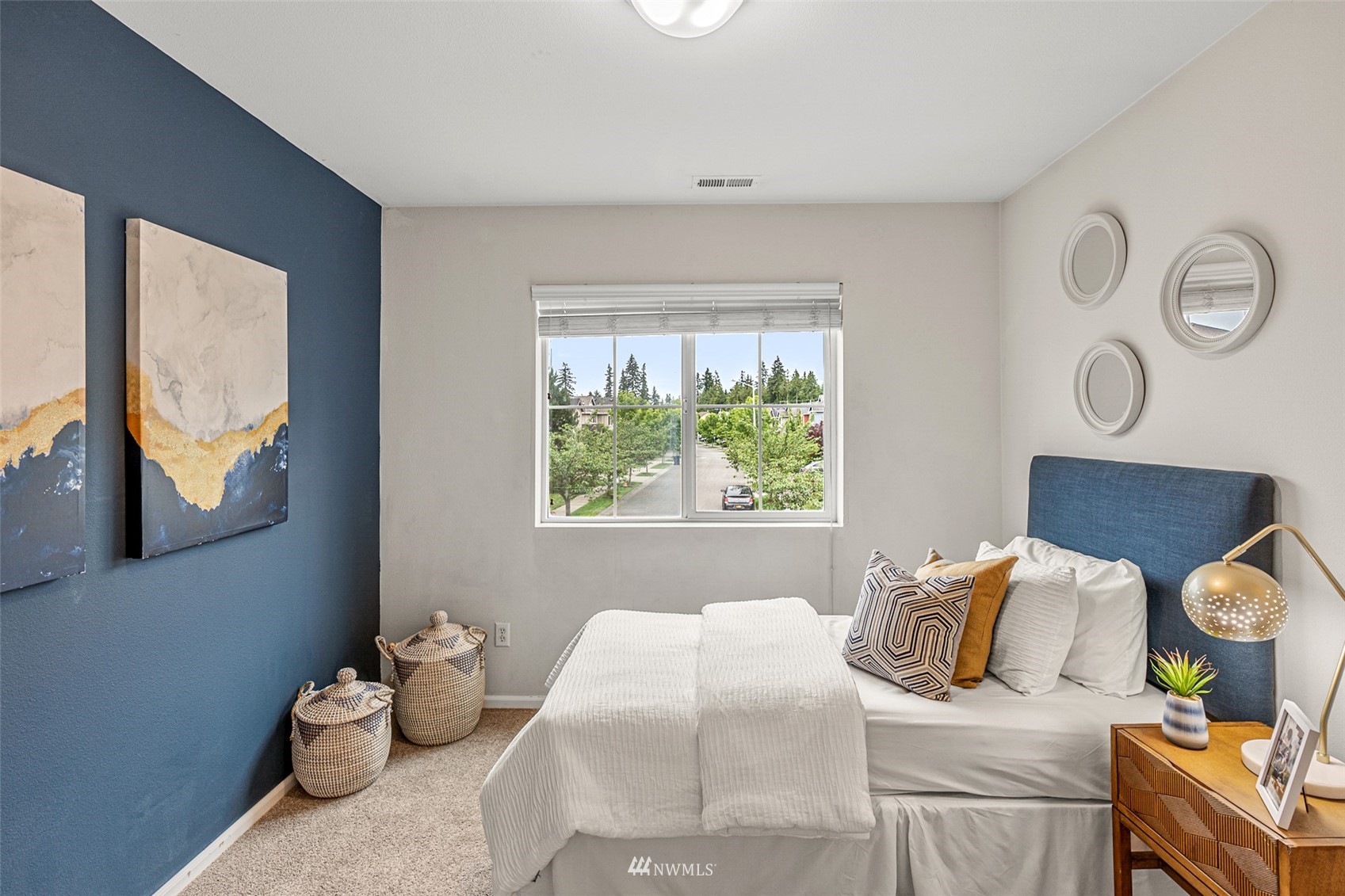 3509 160th Place Southeast Bothell, WA 98012 - Photo 20 of 31 a bedroom with a bed and wooden floor