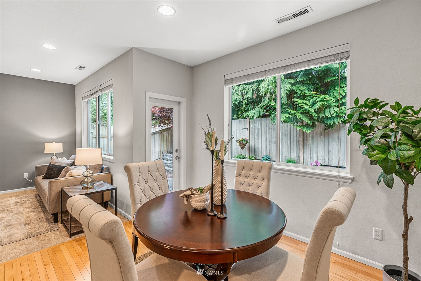 3509 160th Place Southeast Bothell, WA 98012 - Photo 7 of 31 a living room with furniture and a potted plant