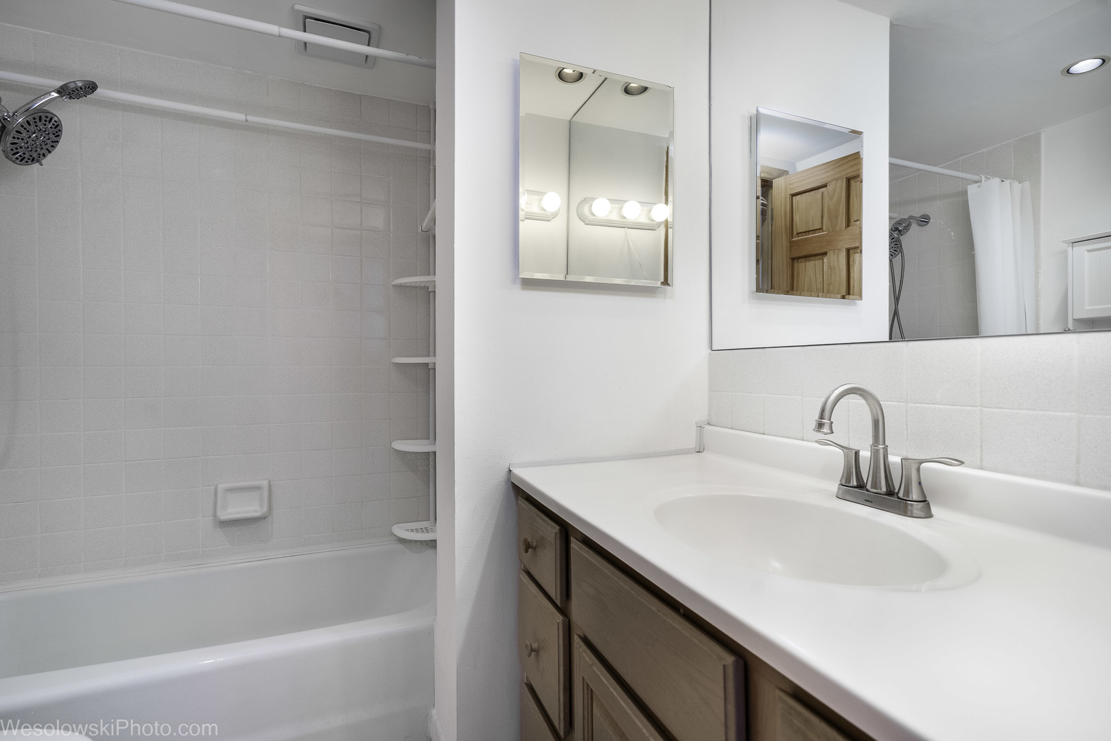 8359 West Addison Street, Unit 503 Chicago, IL 60634 - Photo 15 of 19 a bathroom with a sink and a mirror