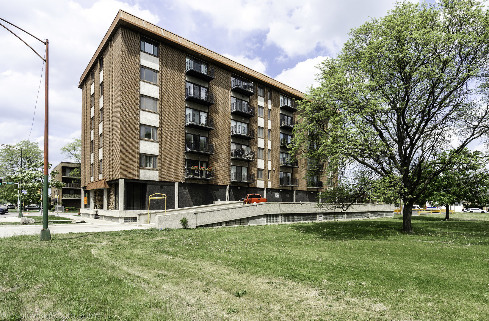 8359 West Addison Street, Unit 503 Chicago, IL 60634 - Photo 19 of 19 a front view of building with yard