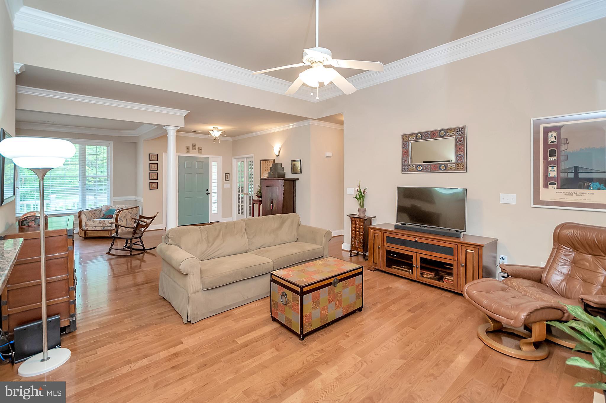 102 Birdie Road Locust Grove, VA 22508 - Photo 10 of 35 a living room with furniture a flat screen tv and a window