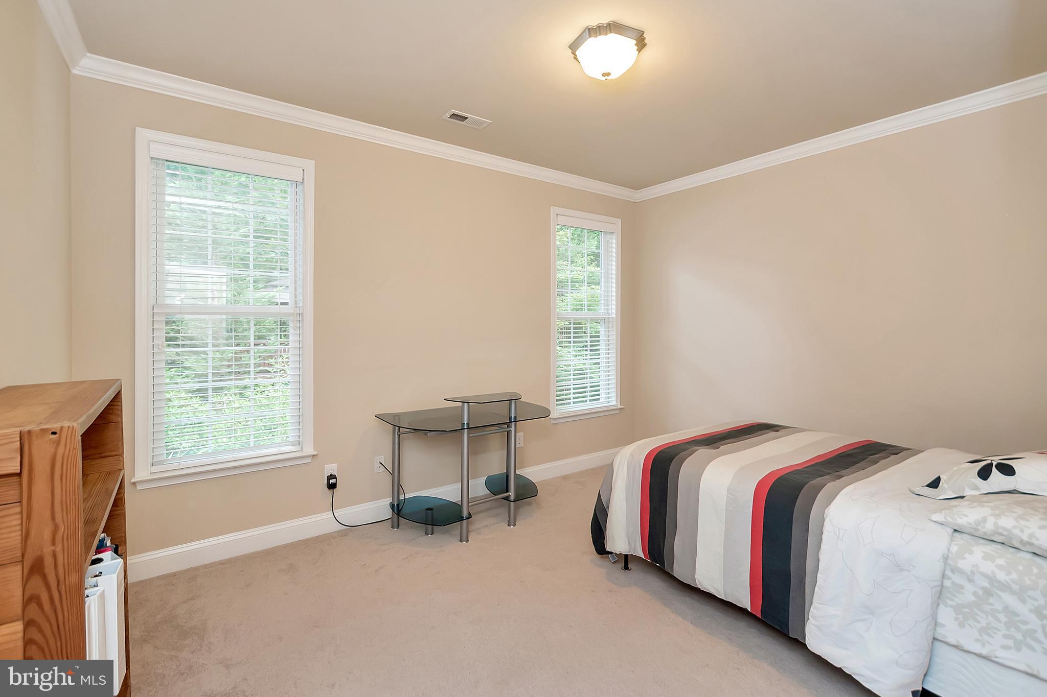 102 Birdie Road Locust Grove, VA 22508 - Photo 20 of 35 a bed room with a bed and a chair