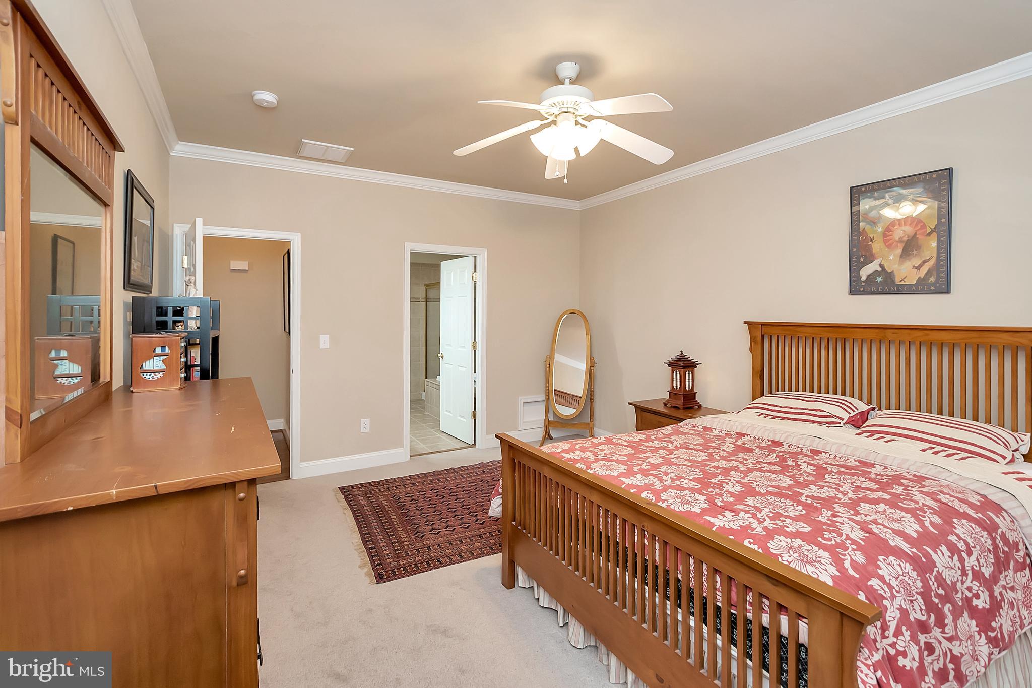102 Birdie Road Locust Grove, VA 22508 - Photo 23 of 35 a bedroom with a bed window and a dresser
