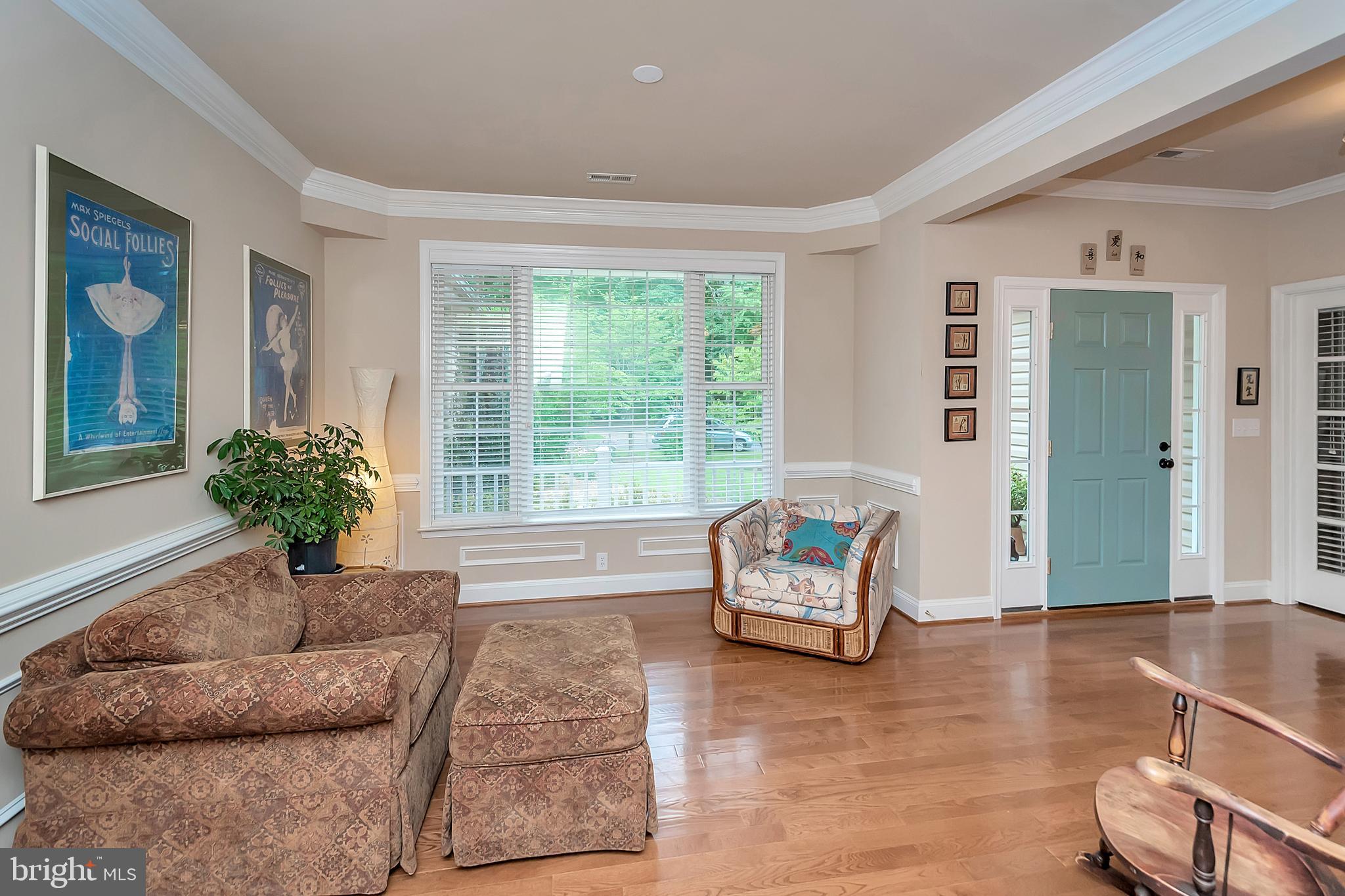 102 Birdie Road Locust Grove, VA 22508 - Photo 6 of 35 a living room with furniture and a large window