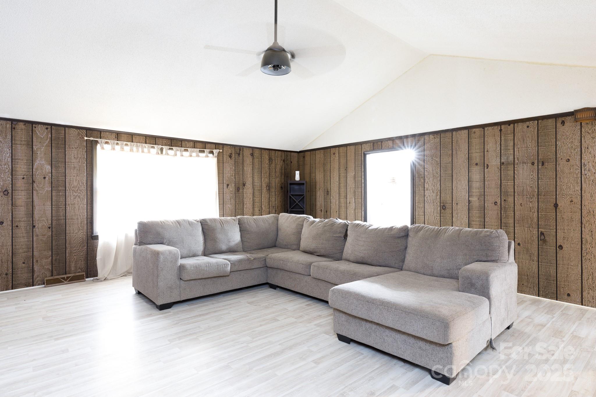 3393 Mt Holly Road Edgemoor, SC 29712 - Photo 6 of 21 a living room with furniture and a window