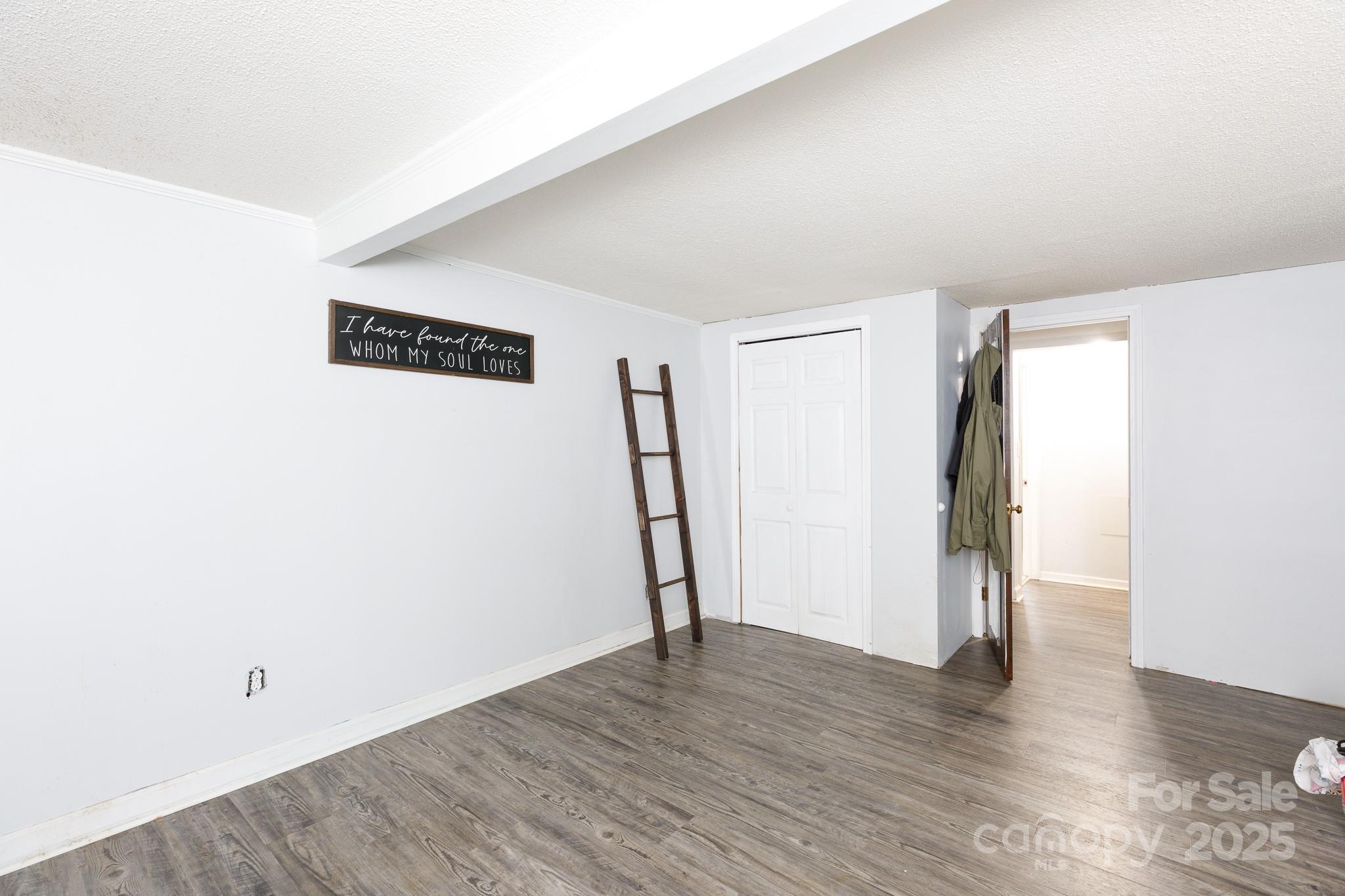 3393 Mt Holly Road Edgemoor, SC 29712 - Photo 7 of 21 a view of empty room with wooden floor
