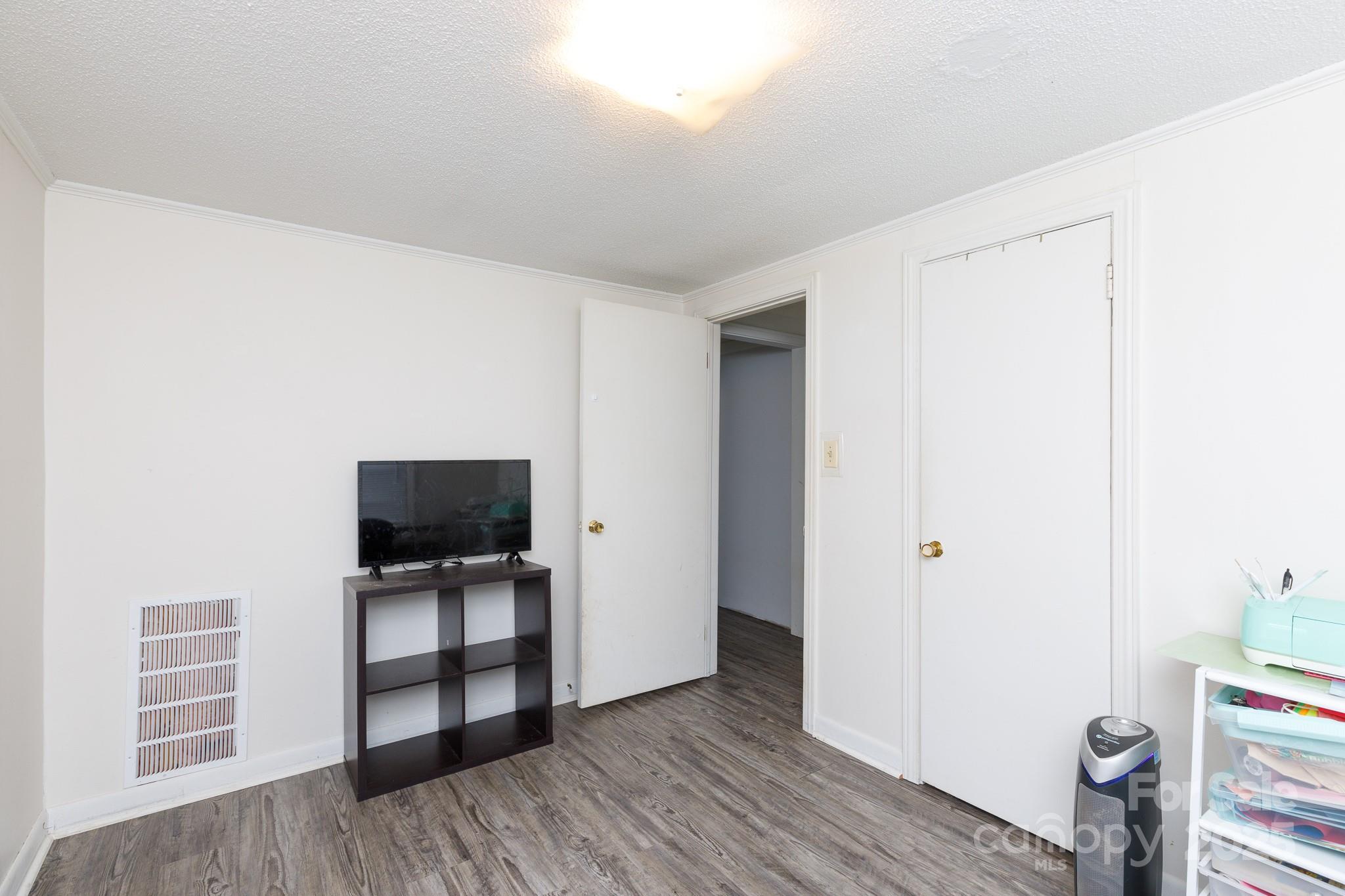 3393 Mt Holly Road Edgemoor, SC 29712 - Photo 10 of 21 a view of a livingroom with furniture and wooden floor