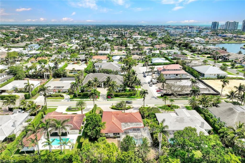 529 Neapolitan Way Naples, FL 34103 - Photo 12 of 18 an aerial view of residential houses with outdoor space