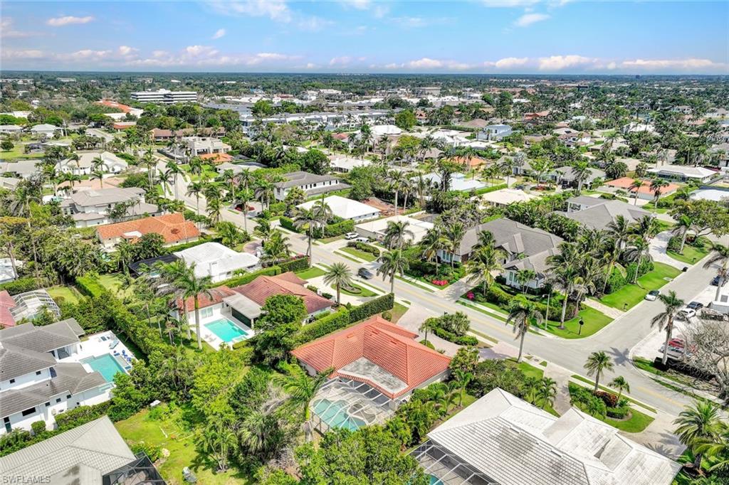 529 Neapolitan Way Naples, FL 34103 - Photo 13 of 18 an aerial view of residential houses with outdoor space