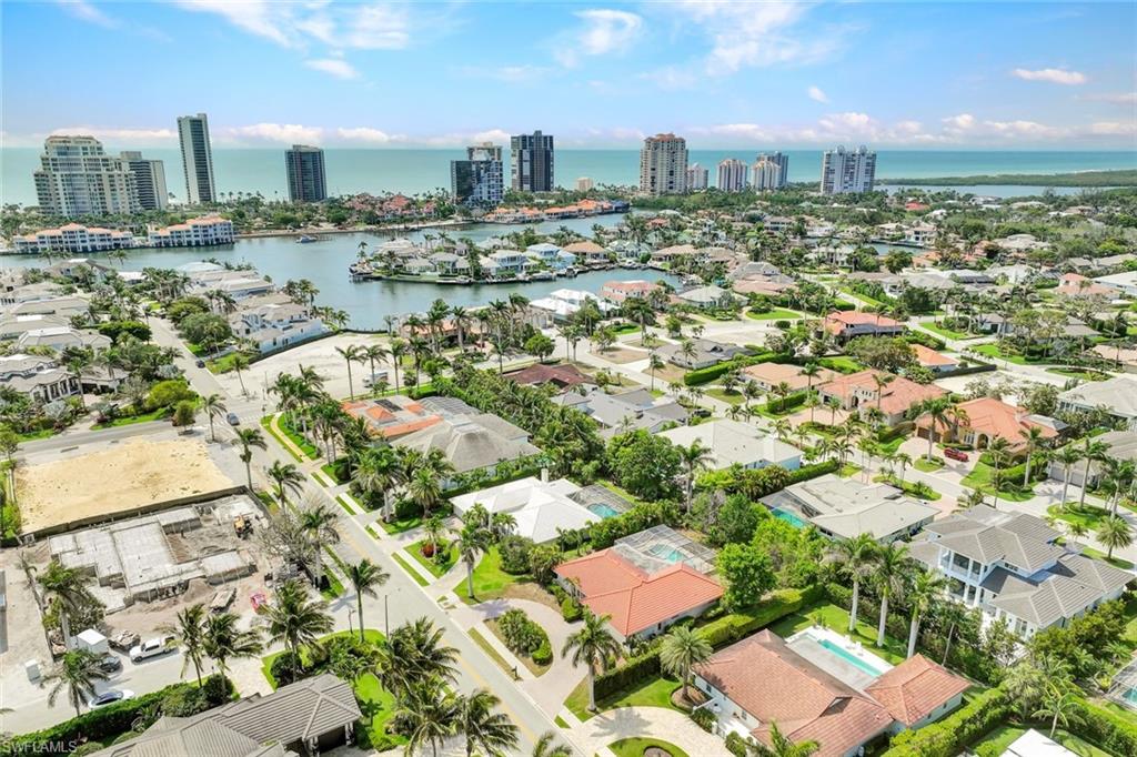 529 Neapolitan Way Naples, FL 34103 - Photo 16 of 18 an aerial view of a city with lots of residential buildings