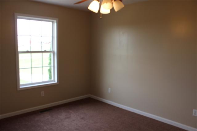 5773 Youngville Road Springfield, TN 37172 - Photo 13 of 19 an empty room with a window