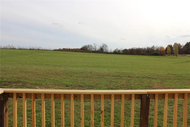 5773 Youngville Road Springfield, TN 37172 - Photo 16 of 19 a view of a balcony with an outdoor space and seating