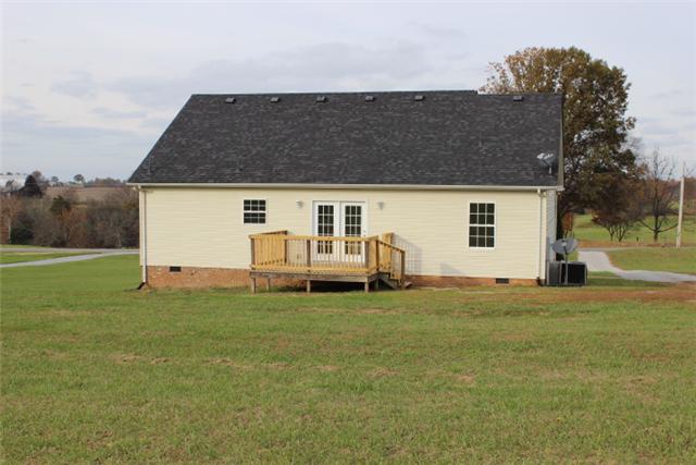 5773 Youngville Road Springfield, TN 37172 - Photo 17 of 19 a house that has a big tree in front of it