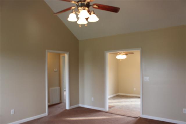 5773 Youngville Road Springfield, TN 37172 - Photo 3 of 19 wooden floor in an empty room with a window