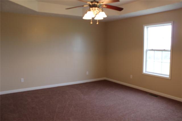 5773 Youngville Road Springfield, TN 37172 - Photo 9 of 19 an empty room with a window