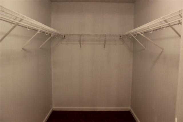 5773 Youngville Road Springfield, TN 37172 - Photo 10 of 19 a view of walk in closet with empty racks