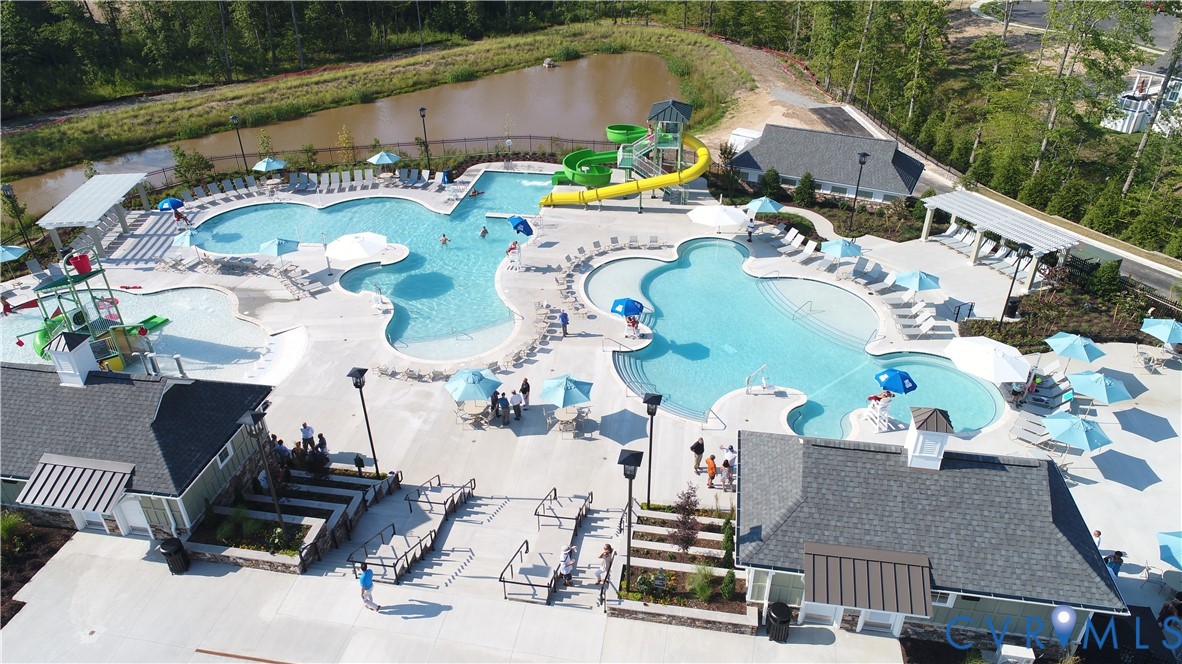 18775 Palisades Ridge Moseley, VA 23120 - Photo 28 of 38 an aerial view of a house with pool and chairs