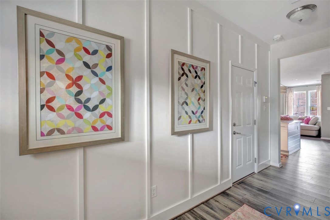18775 Palisades Ridge Moseley, VA 23120 - Photo 5 of 38 a view of a hallway with painting on the wall