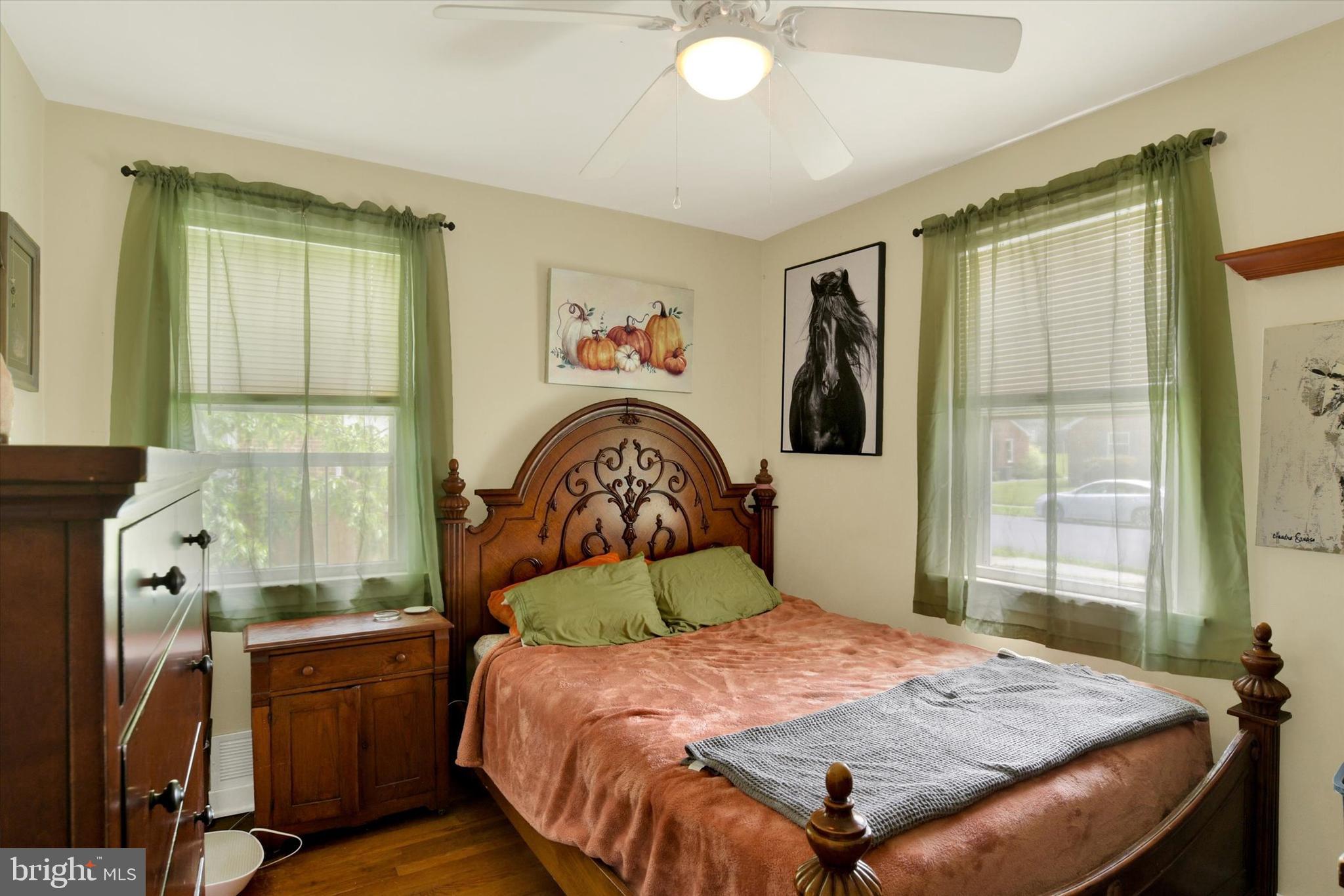 4712 Ruth Ann Street Harrisburg, PA 17109 - Photo 12 of 26 a bedroom with a bed and a window
