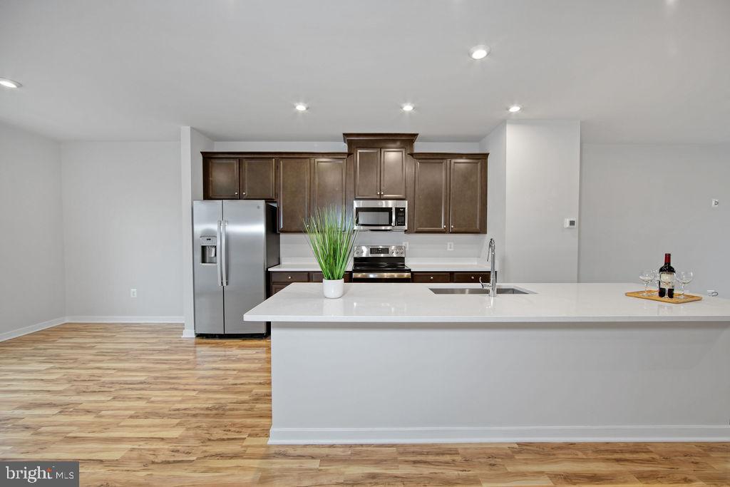 14190 Gypsum Loop Chantilly, VA 20151 - Photo 5 of 38 Gourmet Kitchen with Breakfast Bar Island