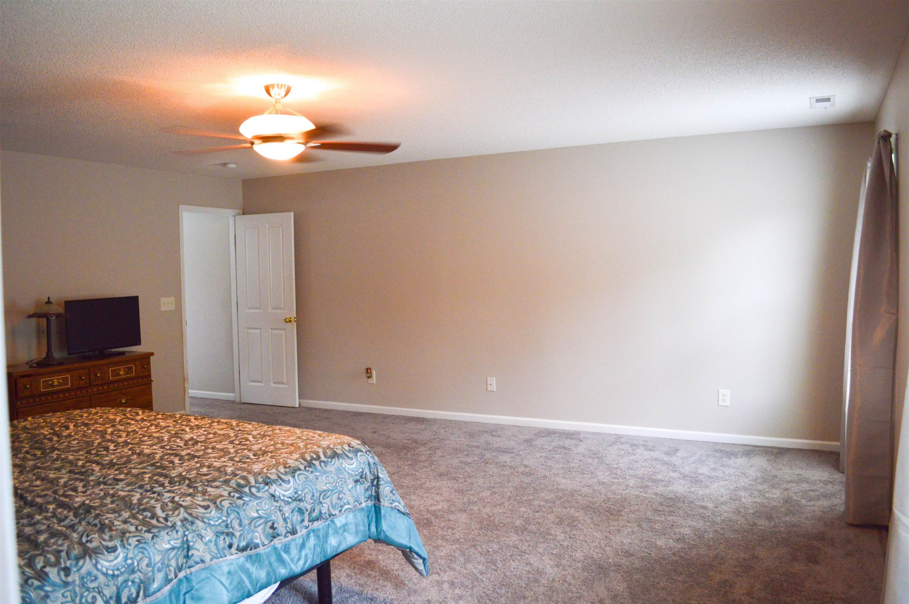 6846 Harter Court Raleigh, NC 27610 - Photo 25 of 47 Master Bedroom