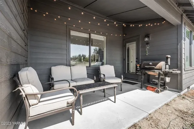 a outdoor living space with furniture