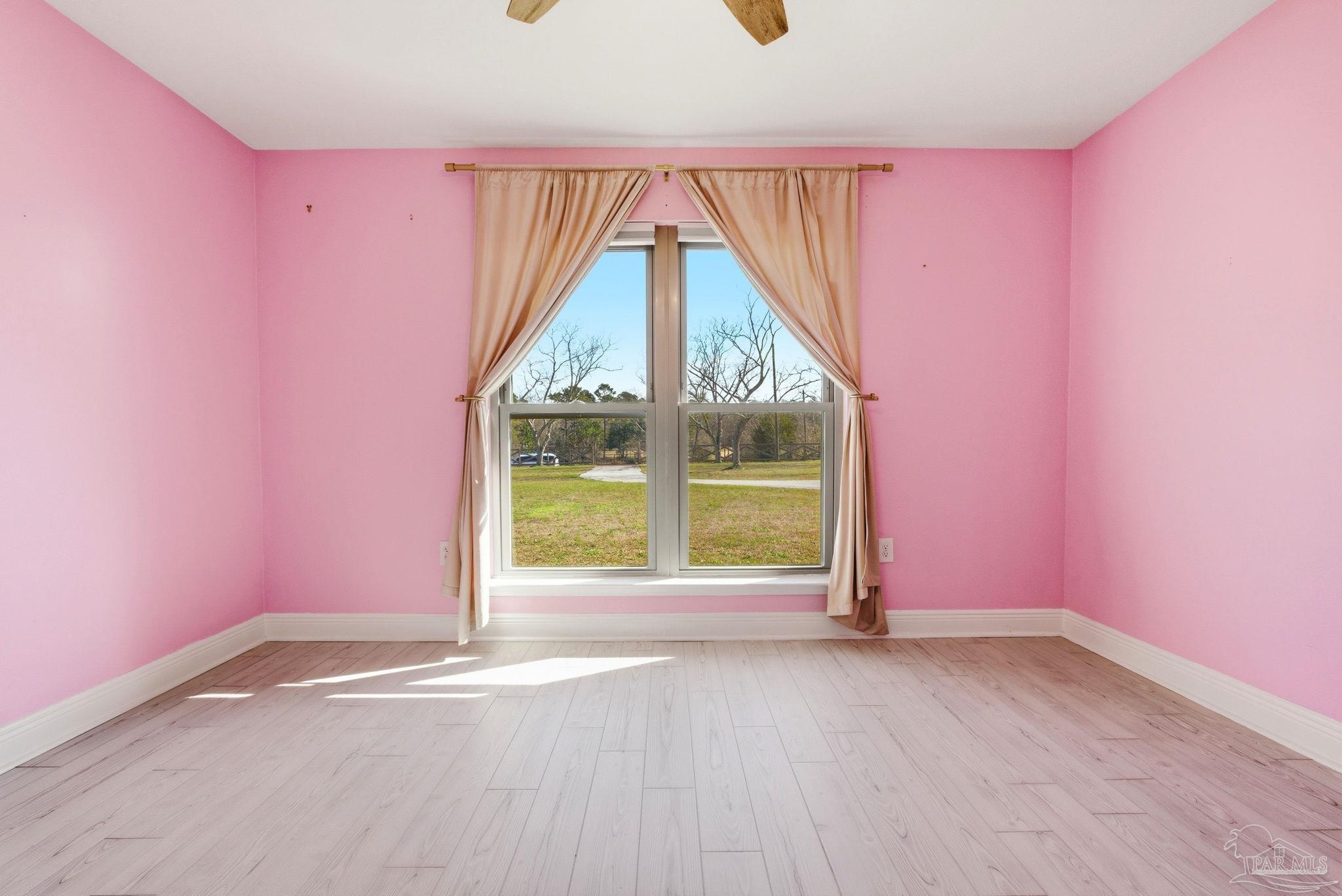 2033 Chavers Road Cantonment, FL 32533 - Photo 19 of 42 a view of a room with a large window