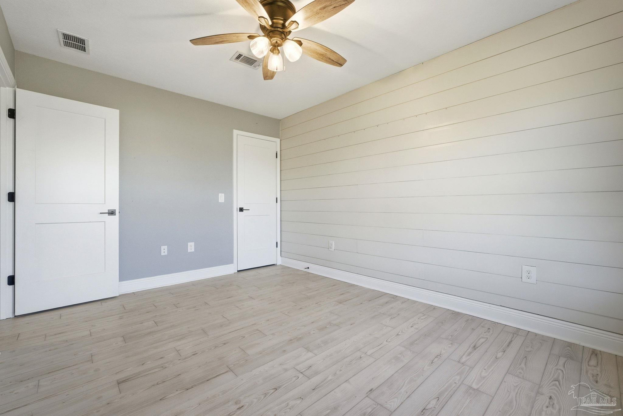 2033 Chavers Road Cantonment, FL 32533 - Photo 24 of 42 wooden floor in an empty room